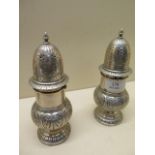 A pair of Continental silver sifters - Height 18cm - approx weight 13 troy oz - marked 800 - both