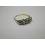An 18ct gold five stone diamond ring size S - approx weight 3 grams - some wear but generally