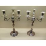 A pair of three branch silver weighted candlesticks - Height 34cm - Sheffield 1893/94 WGJL - both