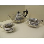 A silver three piece teaset London 1904/05 B&D - some wear and repair but reasonably good - total