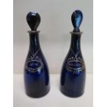 Two Georgian blue glass decanters - Height 24cm - both generally good