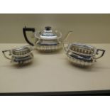 A silver presentation three piece silver tea set Birmingham 1905/06 CH - generally good,