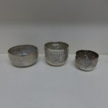 An Eastern white metal bowl - Diameter 11cm - and two hallmarked silver bowls - total weight