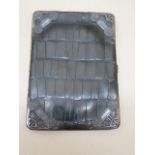 A green crocodile skin card case with silver front corners - 14cm x 10cm - in usable condition