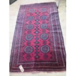 A vintage handmade rug - 187cm x 114cm