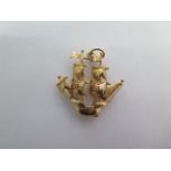 A Portuguese gold sailing ship charm - Height 3cm - approx weight 5 grams - good condition