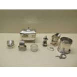 A Walker and Hall silver tea caddy - some bending - five silver napkin rings - all good and a silver