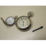 An Elgin Railway Watch 58mm case - ticks but stops and a silver pocket watch - 36mm case - not