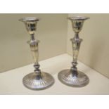 A pair of weighted silver candlesticks - Height 22cm - London 1896/97 William Hutton & Sons Ltd -