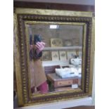 A gilt wall mirror - 56cm x 47cm