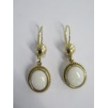 A pair of drop cabochon opal earrings in 18ct gold with safety wires - approx weight 8.9 grams -
