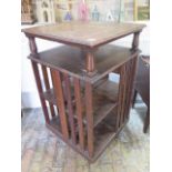 A 1920's oak revolving bookcase - Height 115cm x 66cm square