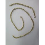 An 18ct 750 gold fancy link 57cm chain and matching 19cm bracelet - total approx weight 48 grams -