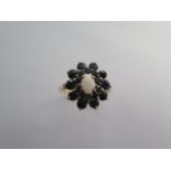 A 9ct yellow gold sapphire and opal cluster ring size N/O - approx weight 2.7 grams - good condition