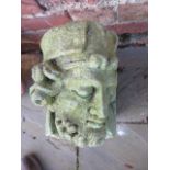 A large cast stone corbel of a King marked 1957 E Ros - Width 18cm x Depth 38cm