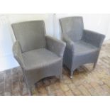 A pair of Lloyd Loom style indoor chairs
