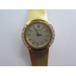 A ladies 18ct yellow gold Rolex 1400 calibre manual wind bracelet wristwatch with diamond set