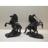A pair of bronze Marley horses - Height 28cm - both with good patina, one missing a rivet/stay,