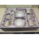 A Crown Porcelain six place coffee set - boxed, as new