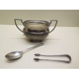 A silver sugar bowl, a silver spoon and a silver nip - approx weight 11.4 troy oz