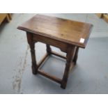 An antique style oak joint stool in good condition and colour - Height 51cm x Width 48cm