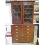 A 19th century mahogany secretaire bookcase with a two door top having adjustable shelves above a