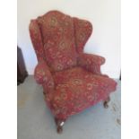 A 1930's wing armchair