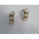 A pair of 14ct opal earrings - 16mm long - approx weight 2.8 grams - good condition