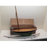 A Tri-ang wooden pond yacht - Shamrock - 53cm long with original box - crack to keel, otherwise