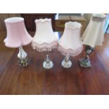 A pair of porcelain figural and glass table lamps - Height 42cm - one with damage - and two other