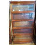A mahogany five section glazed Globe Wernicke stacking bookcase all with labels, all glass intact,