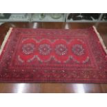 A vintage handmade rug - 118cm x 77cm