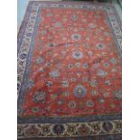 A hand knotted woolen Sarough rug - 3.70m x 2.58m - in good condition