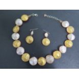 A Murano glass 47cm necklace and matching earrings - 23mm diameter - in good condition