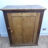 A pine cupboard with one shelf in polished condition - Height 126cm x Width 97cm x Depth 48cm