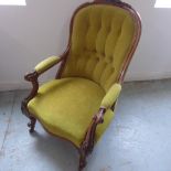 A Victorian carved button back open armchair in generally good condition, good colour and patina,