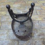 A cast iron boot scraper - 29cm x 21cm
