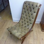 A slipper chair, walnut wood and leather with scroll frame and plain legs - Height 100cm x Width