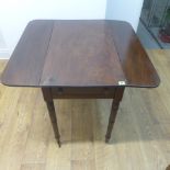 A mahogany drop leaf Pembroke table with a drawer - Height 73cm x 83cm x 86cm wide extended