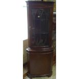 A mahogany effect corner cupboard with a glazed top - Height 180cm x Width 65cm - in good condition