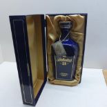 A cased bottle of Ballantines Rare Aged Scotch Whisky