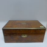 A Victorian brass bound walnut writing slope with a fitted interior and two secret drawers - 17cm