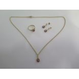 A matched 9ct ring/earrings and gilt pendant on a 46cm chain - ring size N - total weight approx 8.4
