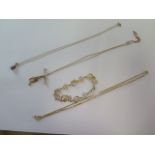 Two 9ct yellow gold chains with pendants, a 9ct yellow gold bracelet - total weight approx 7.3 grams