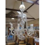 A Victorian cut glass five branch chandelier in working order - Height 67cm