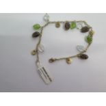 A 9ct yellow gold multi stone bracelet - approx weight 7 grams -RRP £160 - ex jewellers stock