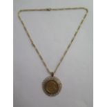 A Victorian gold full sovereign dated 1900 in a 9ct pendant mount on a 44cm chain - total weight