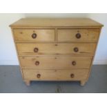 A Victorian stripped pine five drawer chest - Height 104cm x 106cm x 46cm