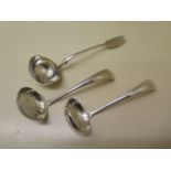 A pair of Continental silver sifter spoons - Length 16cm and a Continental silver ladle - Length