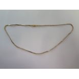 An 18ct yellow and white gold 46cm chain approx weight 7.4 grams